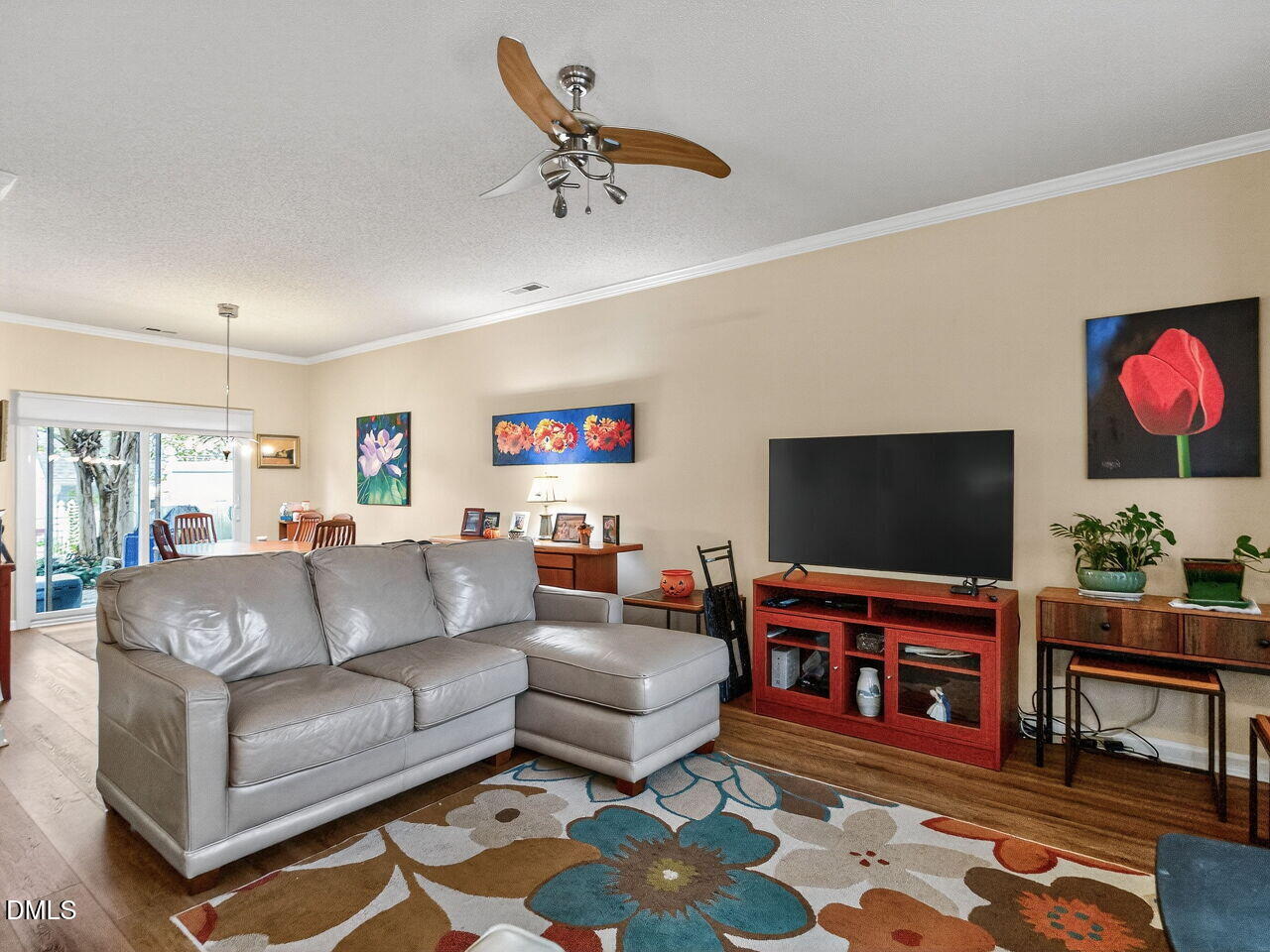 2658 Garden Knoll Lane Raleigh, NC 27614 - Photo 3 of 29 a living room with furniture and a flat screen tv