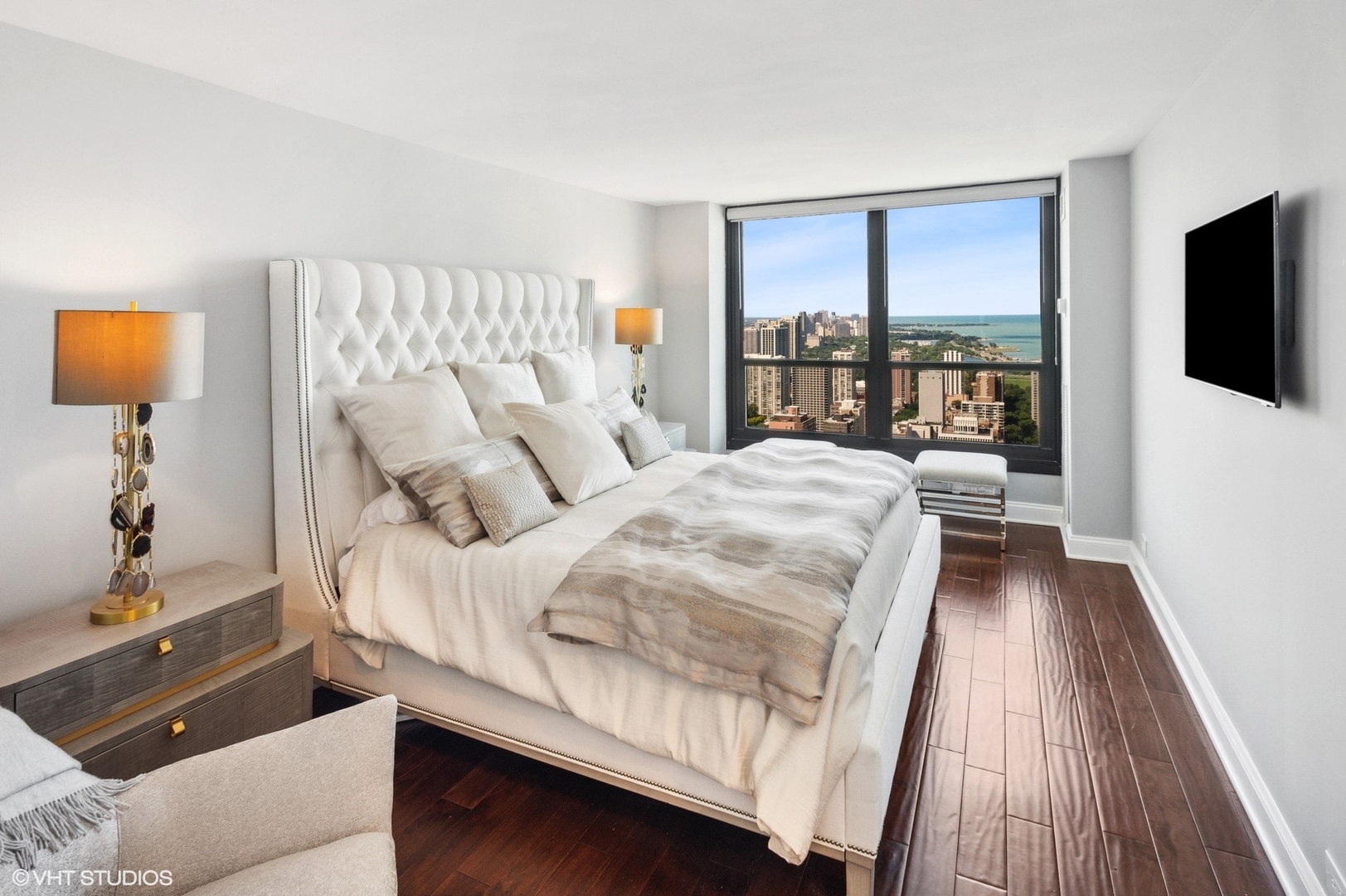 1030 North State Street, Unit 44E Chicago, IL 60610 - Photo 11 of 22 a bedroom with a bed and a view of bedroom