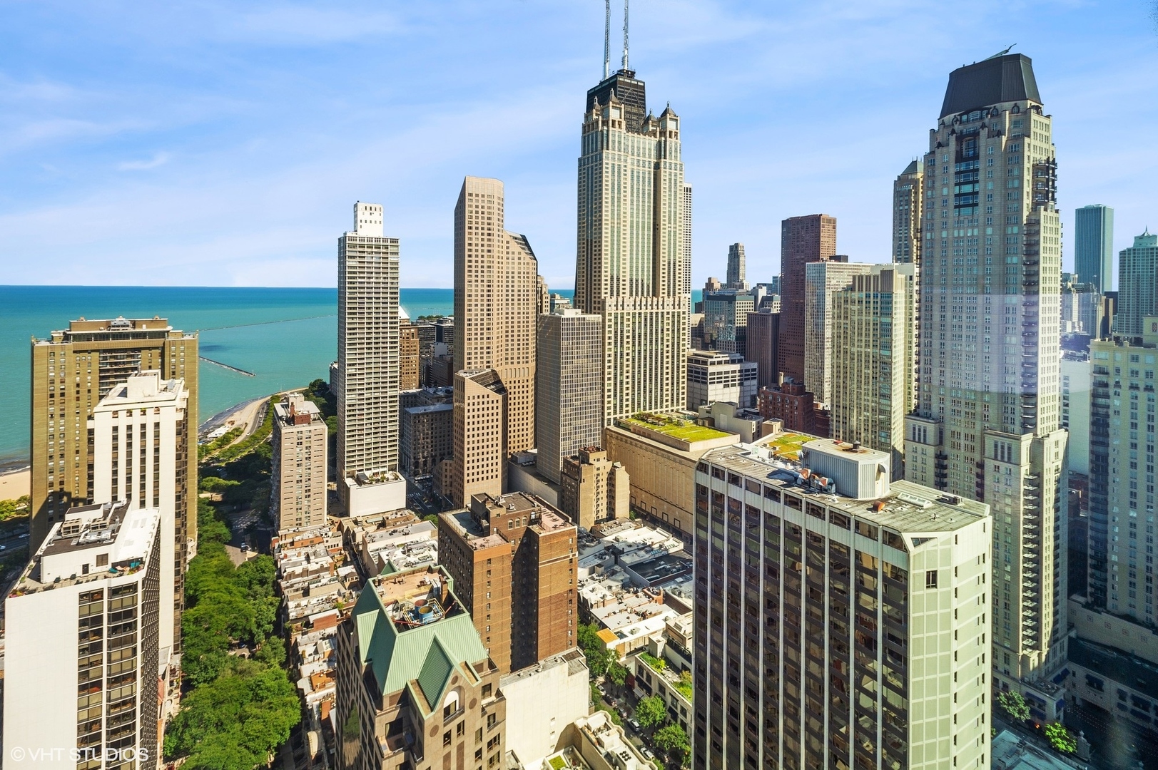 1030 North State Street, Unit 44E Chicago, IL 60610 - Photo 16 of 22 a city view with tall buildings