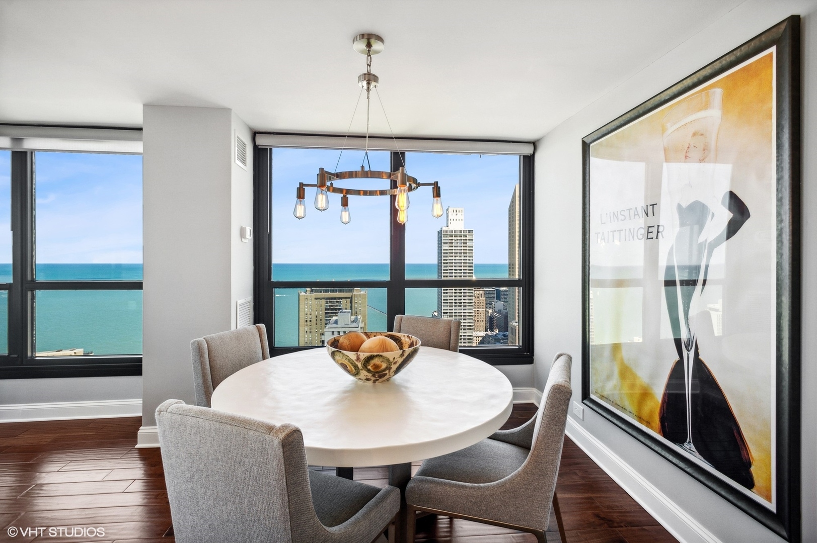 1030 North State Street, Unit 44E Chicago, IL 60610 - Photo 10 of 22 a view of a dining room with furniture window and outside view