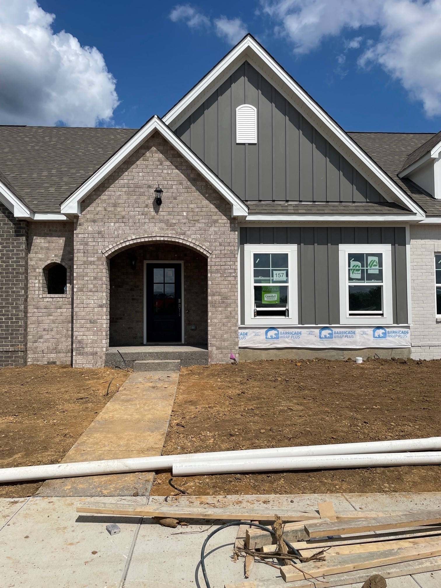9096 Headwaters Drive Franklin, TN 37064 - Photo 1 of 22 a front view of a house with garage