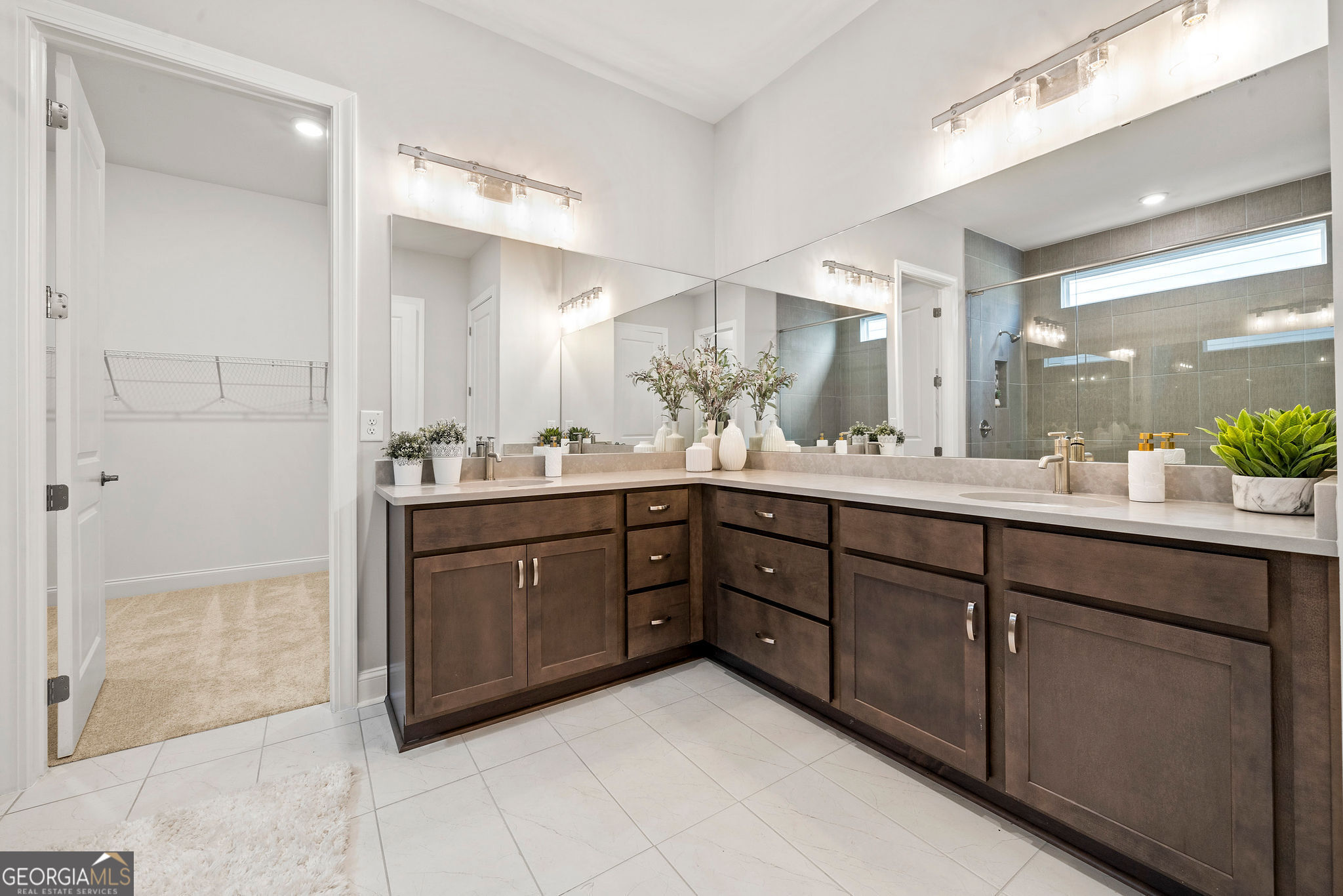 68 Ballyfin Way Newnan, GA 30263 - Photo 13 of 46 a spacious bathroom with a double vanity sink and a mirror
