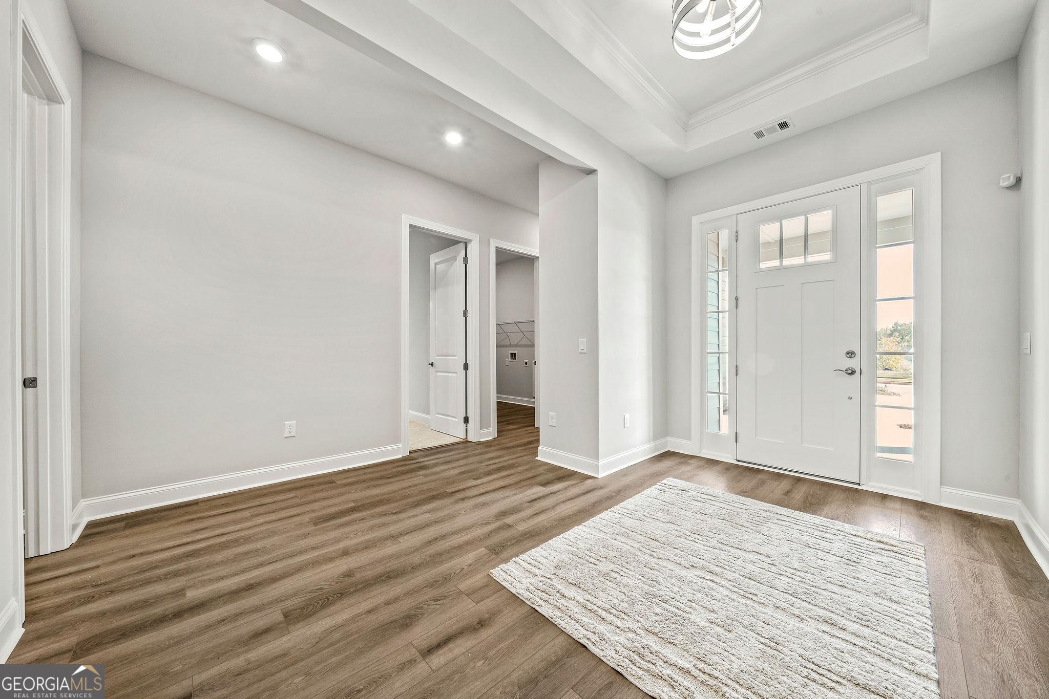 68 Ballyfin Way Newnan, GA 30263 - Photo 24 of 46 a view of an empty room with wooden floor