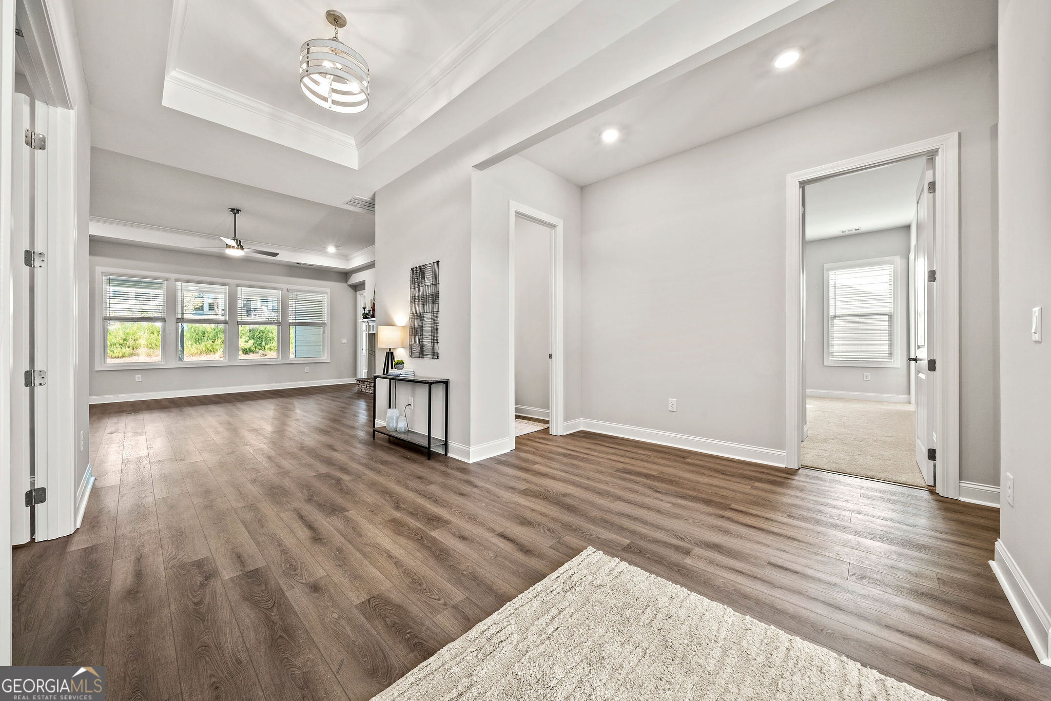 68 Ballyfin Way Newnan, GA 30263 - Photo 26 of 46 a view of an empty room with wooden floor and a window