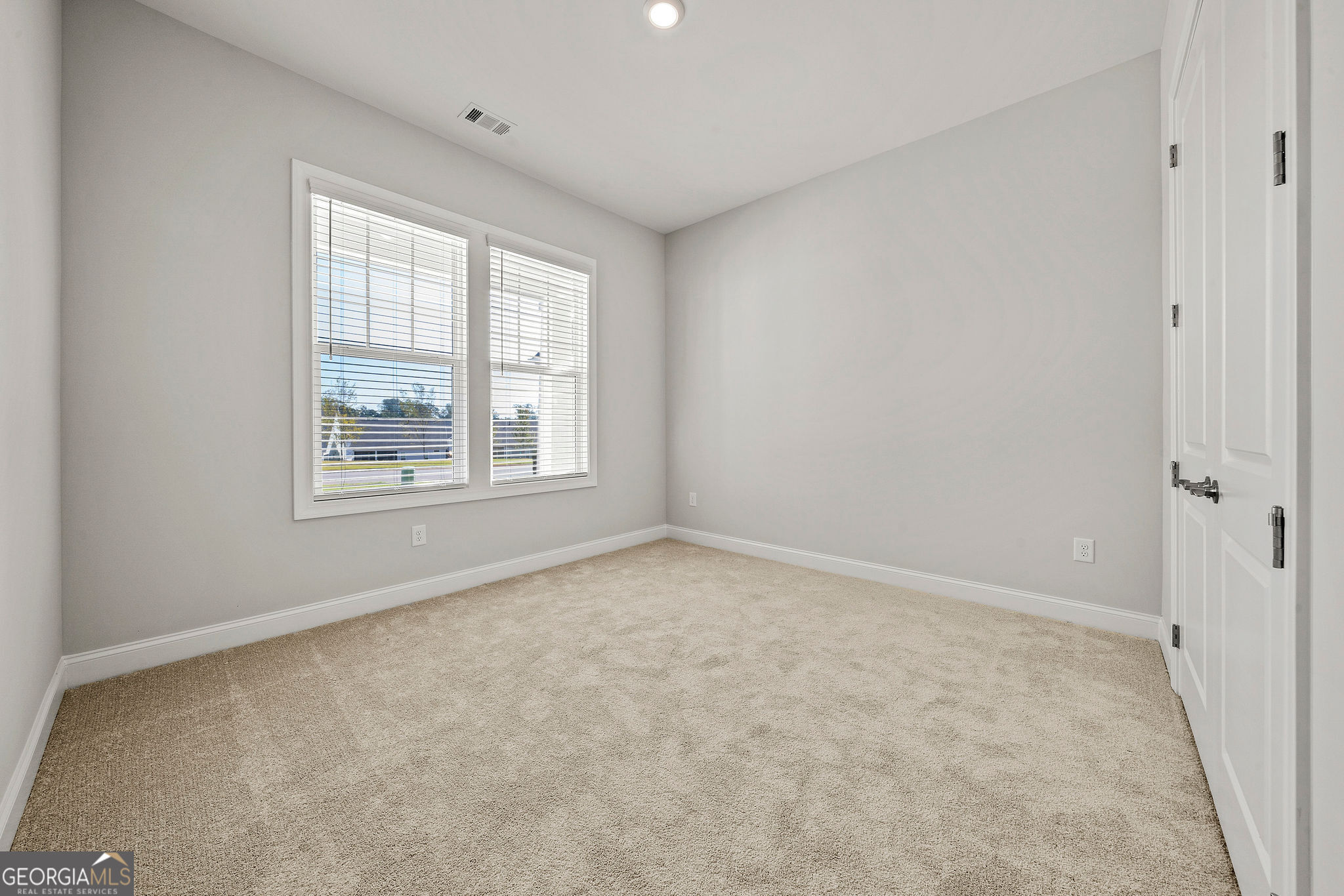 68 Ballyfin Way Newnan, GA 30263 - Photo 35 of 46 an empty room with windows