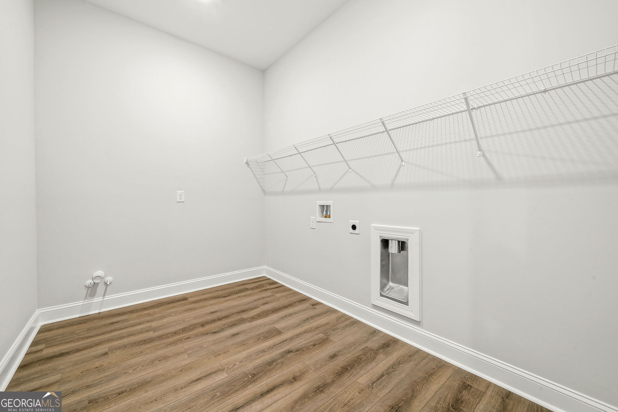 68 Ballyfin Way Newnan, GA 30263 - Photo 37 of 46 a view of a room with wooden floor