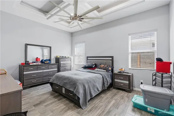 a bedroom with a bed and furniture