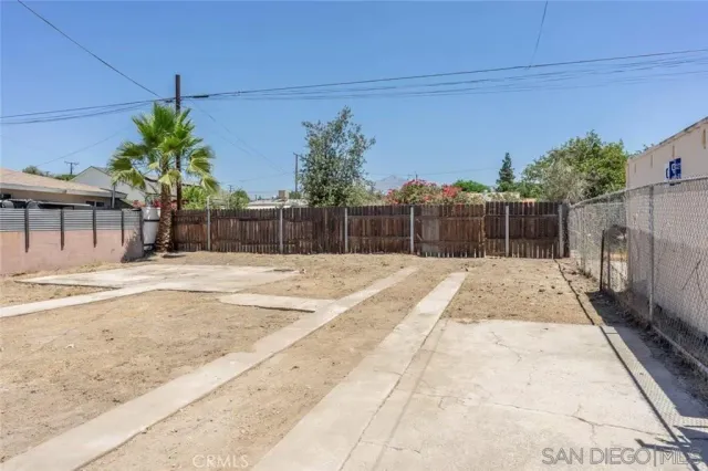 a view of swimming pool with a patio