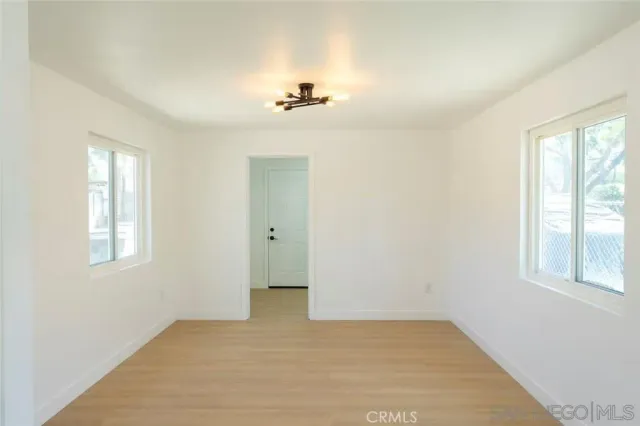 an empty room with windows