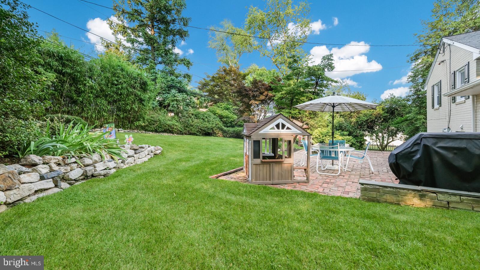 999 George Road Jenkintown, PA 19046 - Photo 40 of 44 Rear yard with stone wall