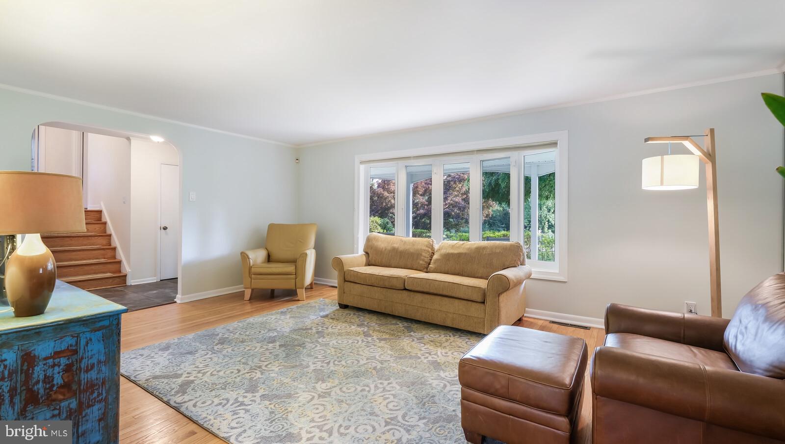 999 George Road Jenkintown, PA 19046 - Photo 7 of 44 Living room with large bow window