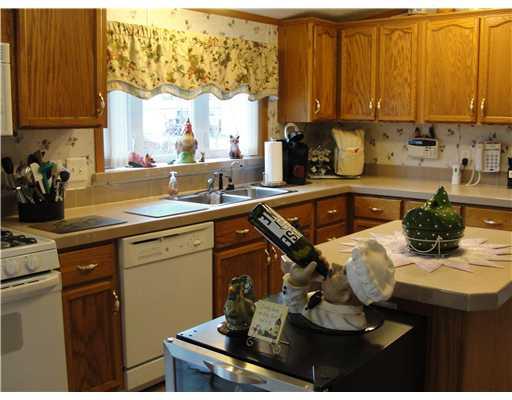 509 Amy Lane Rochester, PA 15074 - Photo 8 of 18 Kitchen. Kitchen also features island & whole house am/fm cd player.