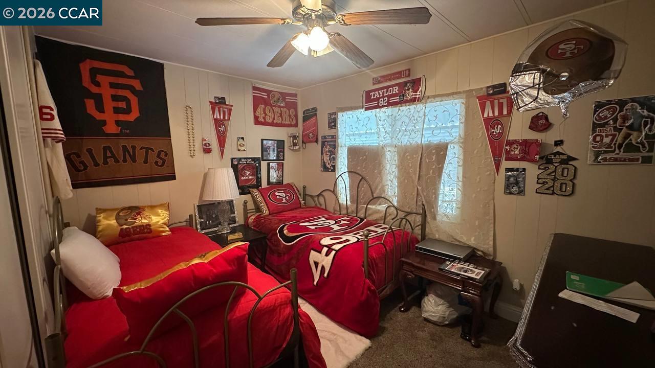 367 Ravine Circle Rancho Cordova, CA 95670 - Photo 18 of 21 a bedroom with furniture and a bed