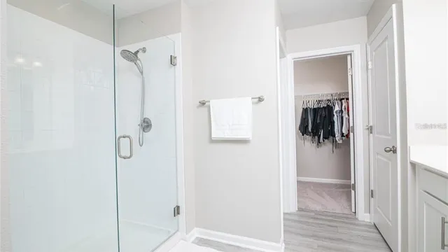 a view of a bathroom from a hallway