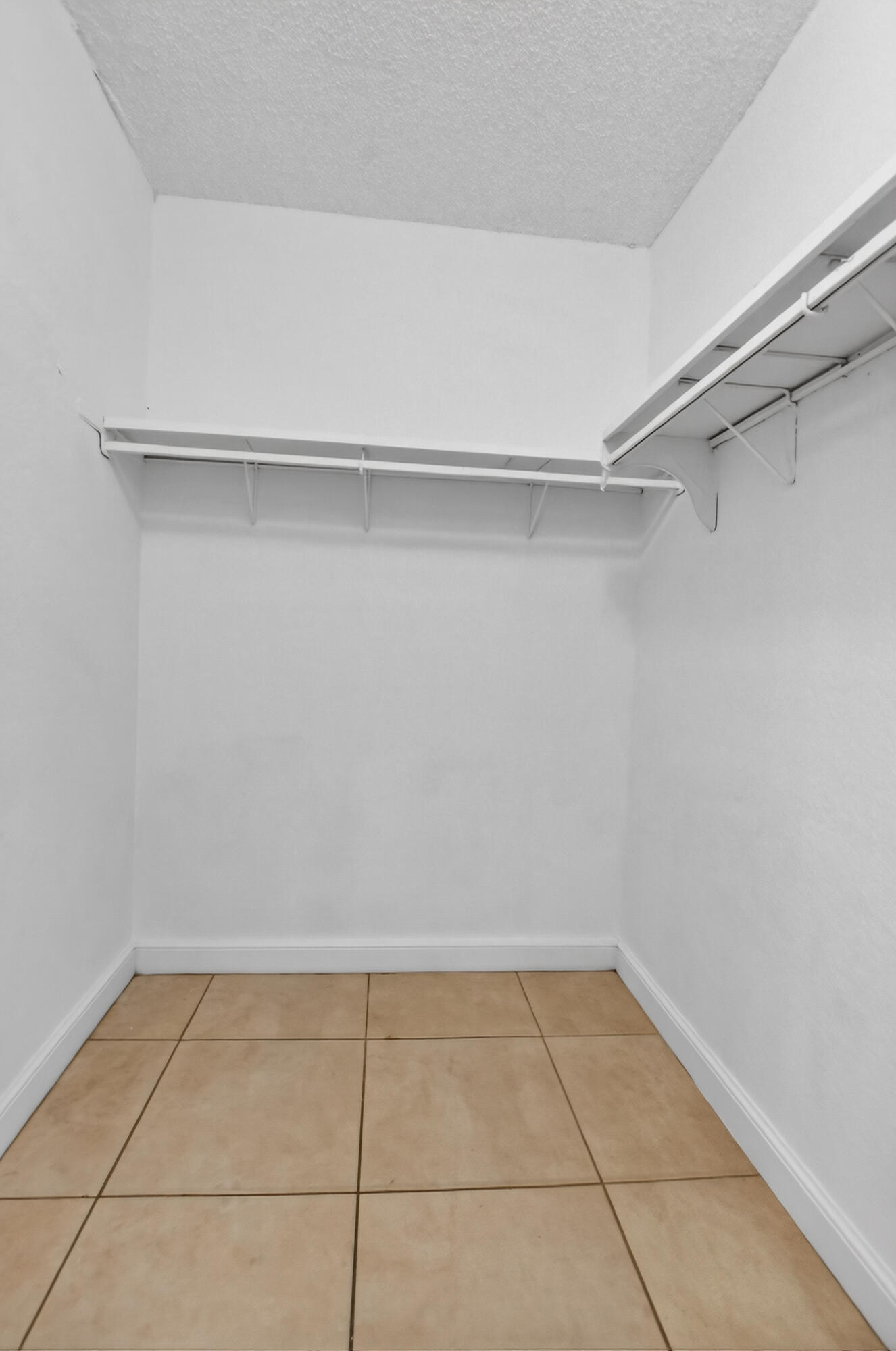 636 Northwest 13th Street, Unit 110 Boca Raton, FL 33486 - Photo 26 of 35 a view of an empty walk in closet