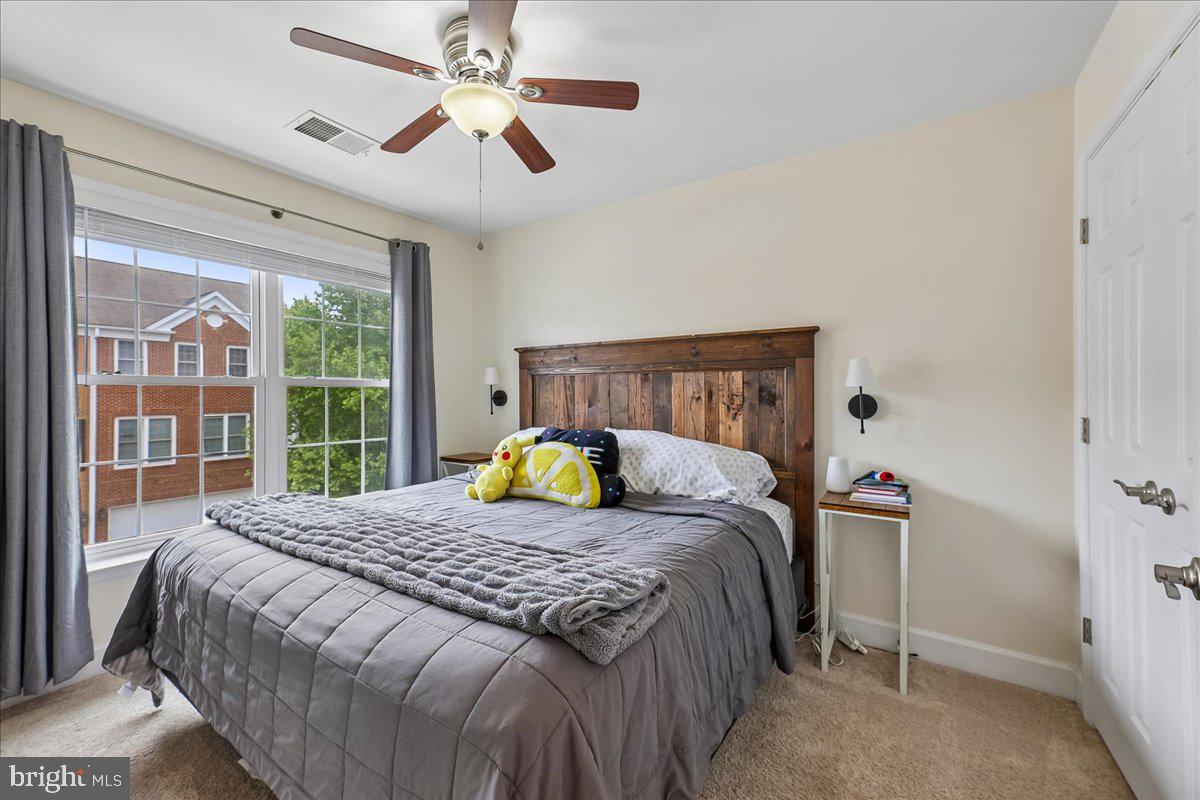 9276 Laurel Ridge Crossing Road Lorton, VA 22079 - Photo 29 of 43 Cozy bedroom with natural light.