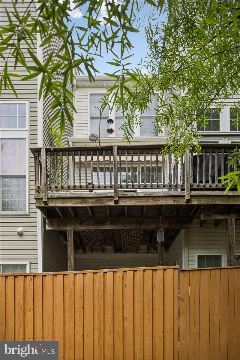 9276 Laurel Ridge Crossing Road Lorton, VA 22079 - Photo 32 of 43 Charming deck nestled in greenery.