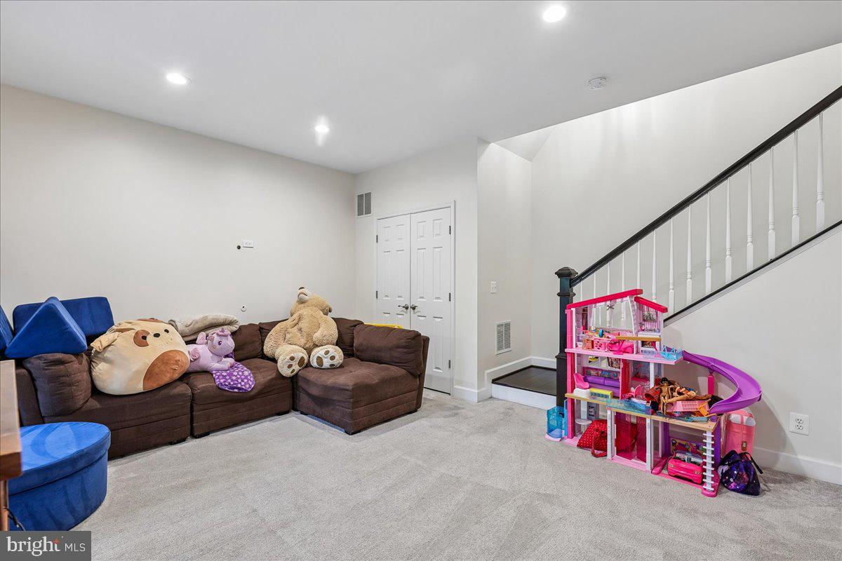 9276 Laurel Ridge Crossing Road Lorton, VA 22079 - Photo 5 of 43 Cozy playroom with inviting charm.