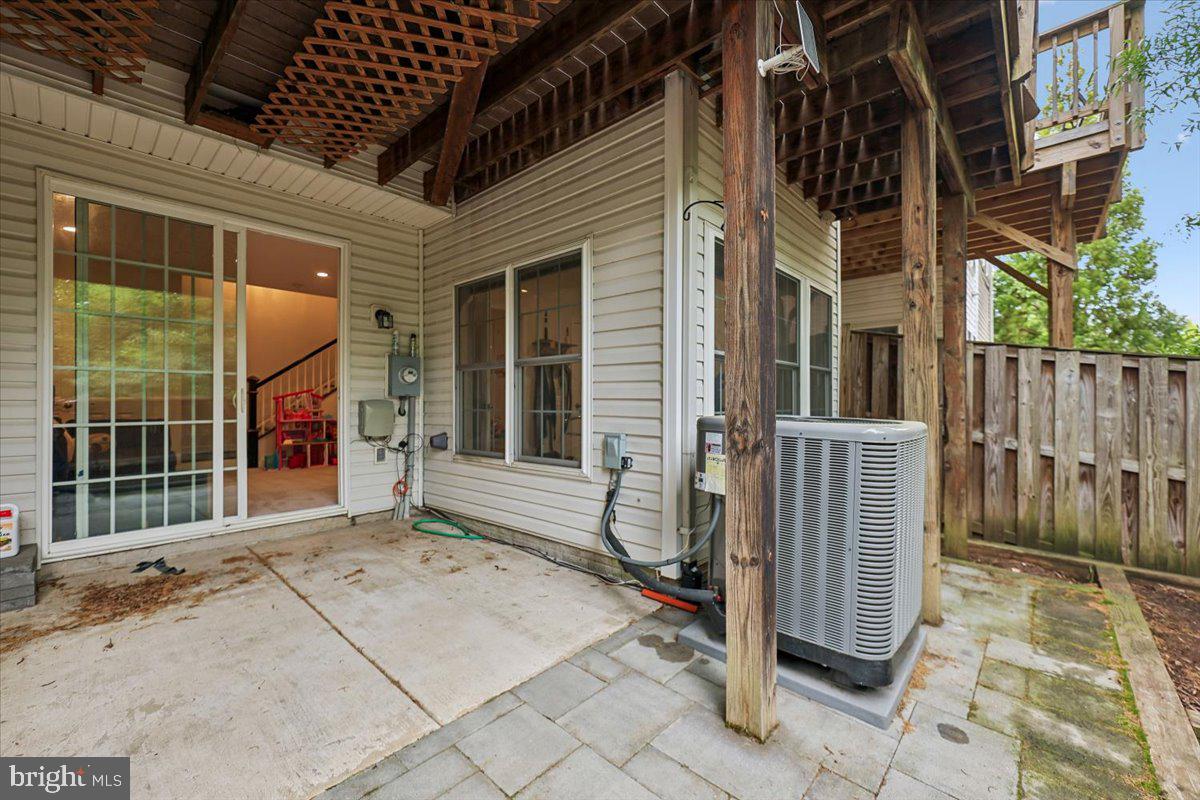 9276 Laurel Ridge Crossing Road Lorton, VA 22079 - Photo 8 of 43 Charming outdoor space with utility features.