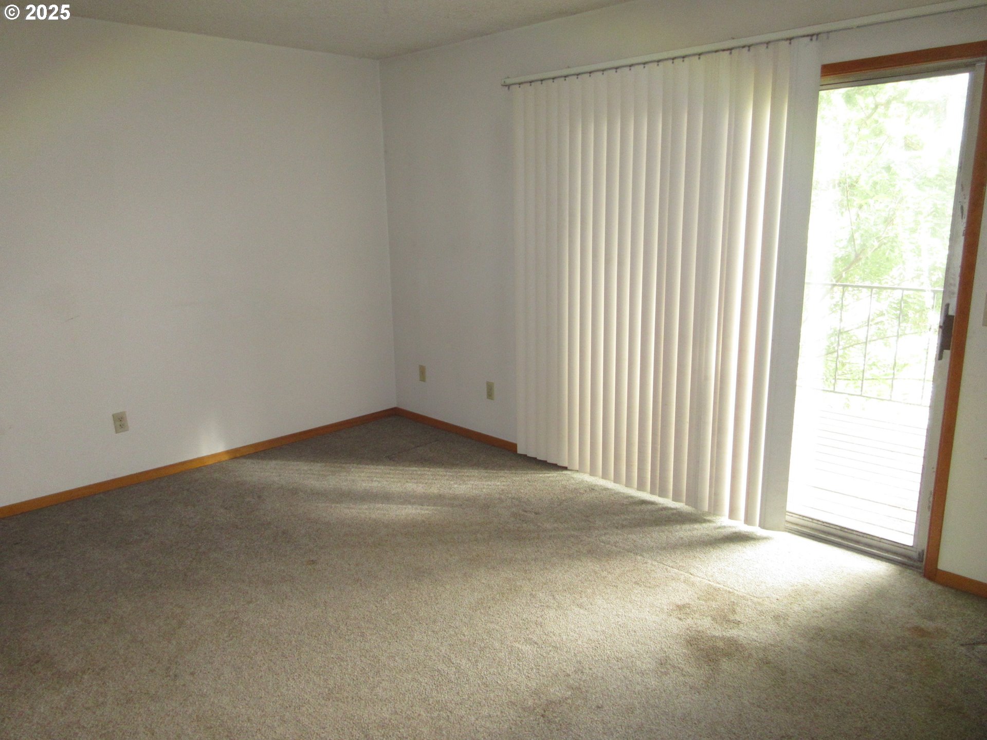 1308 Northeast Hogan Drive, Unit 166 Gresham, OR 97030 - Photo 8 of 13 an empty room with a window