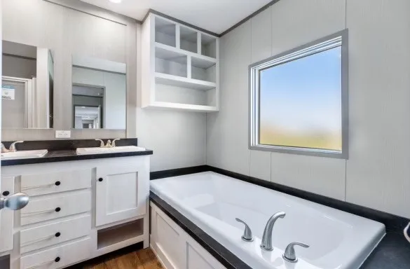a bathroom with a sink and a window