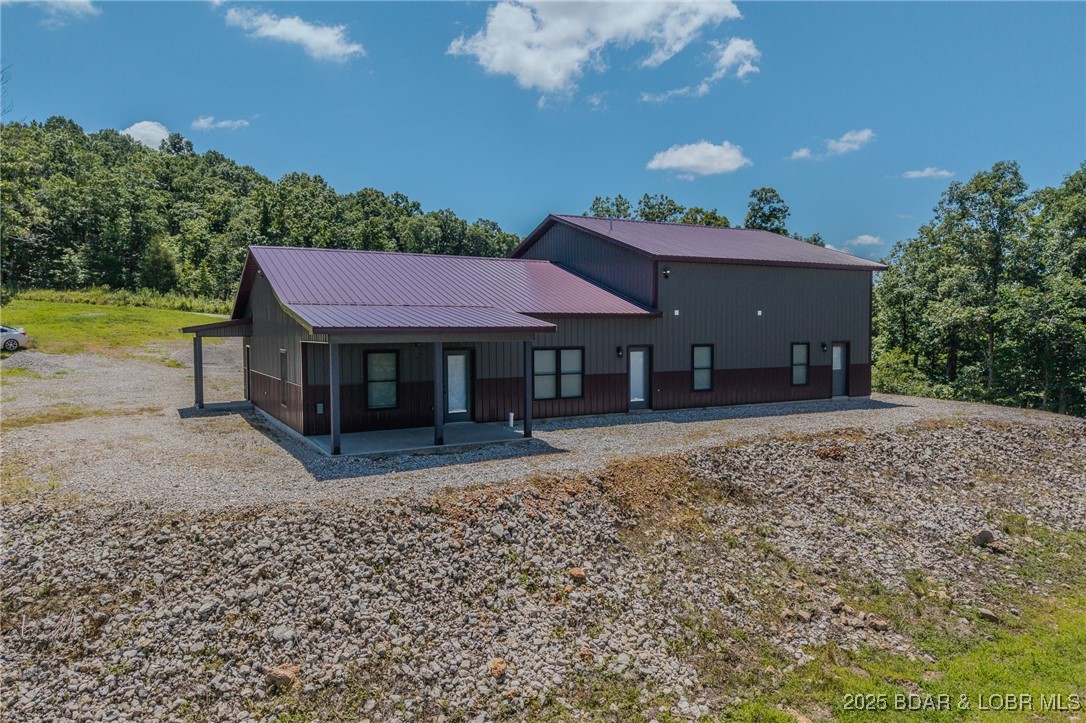 26450 Eagle Point Road, Unit INDIAN CREEK COVE) Barnett, MO 65011 - Photo 21 of 45 2 Patios are located off the mud room & main BR