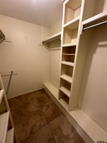 a view of an empty room with empty racks