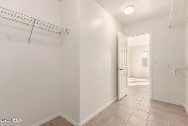 a bathroom with a sink mirror vanity and toilet