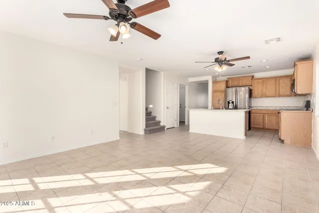 a view of a kitchen with a sink and cabinet