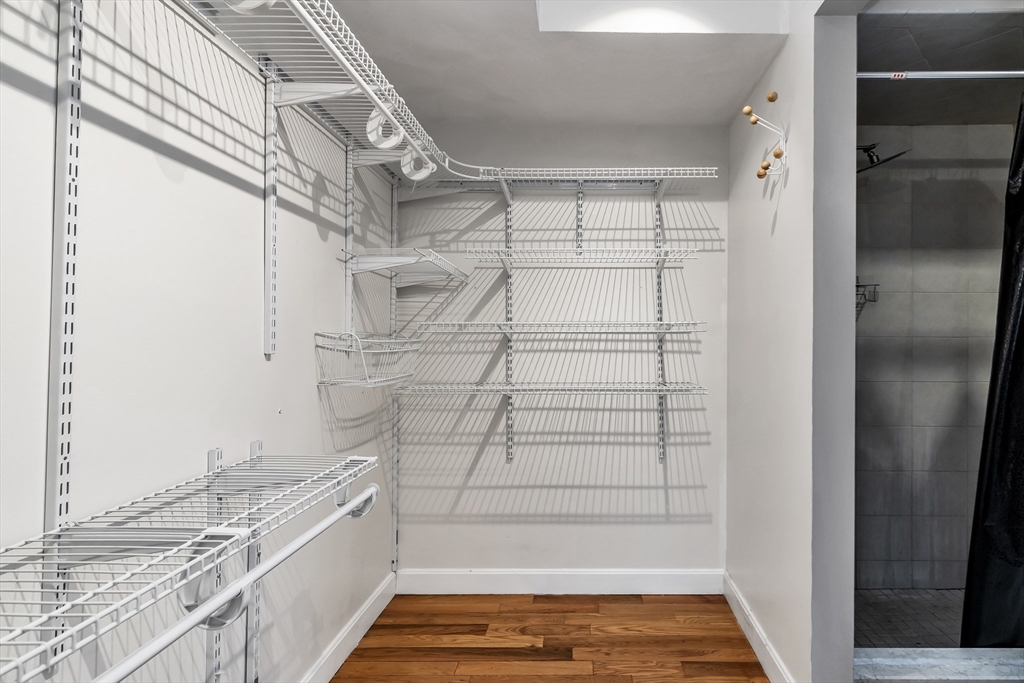 21 Margin Street, Unit 33 Lynn, MA 01905 - Photo 17 of 30 a bathroom with a bathtub and shower