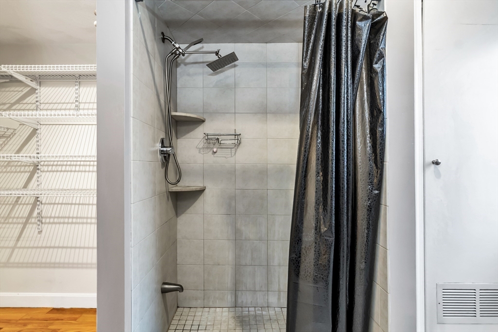 21 Margin Street, Unit 33 Lynn, MA 01905 - Photo 19 of 30 a bathroom with a shower