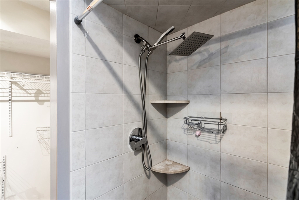 21 Margin Street, Unit 33 Lynn, MA 01905 - Photo 20 of 30 a bathroom with a shower