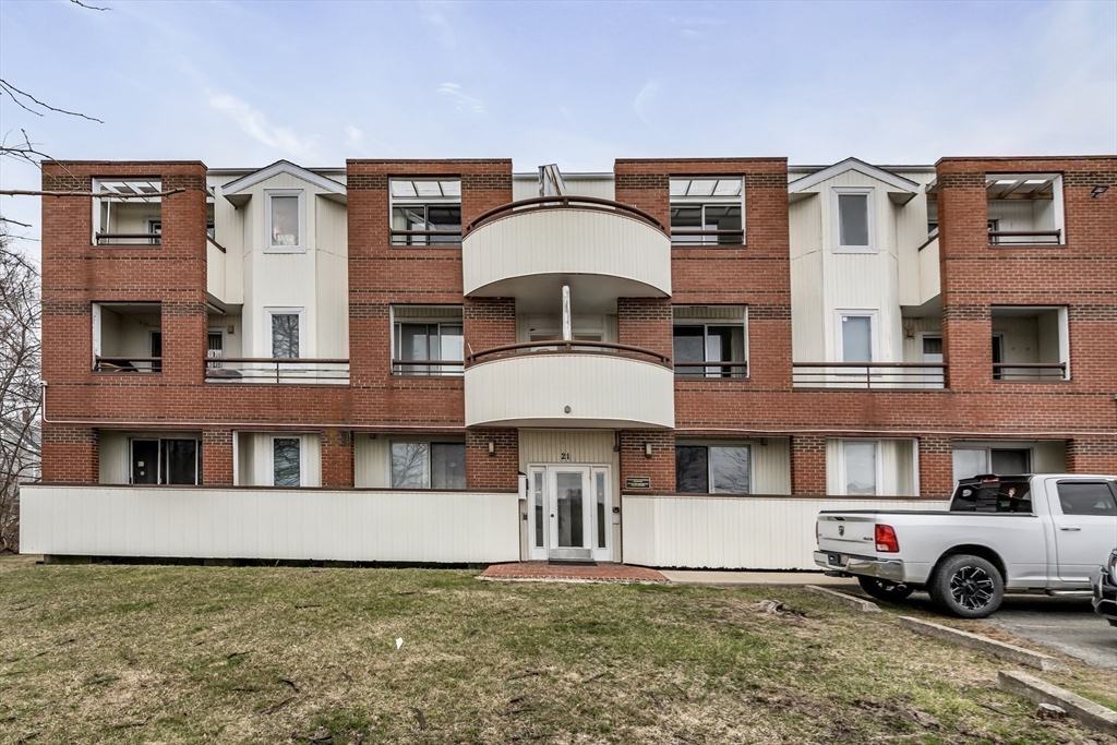 21 Margin Street, Unit 33 Lynn, MA 01905 - Photo 2 of 30 a house view with a outdoor space