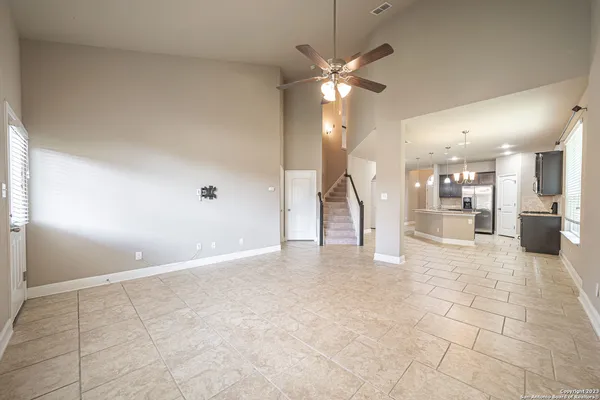 a view of a livingroom with a kitchen