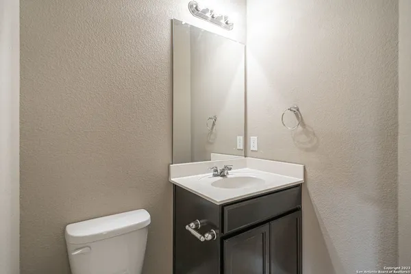 a bathroom with a sink and a toilet