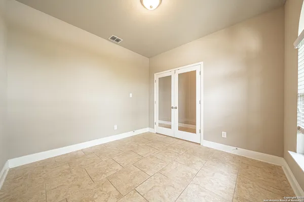 an empty room with natural light