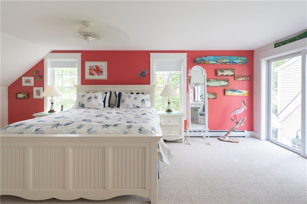 60 Lowells Cove Road Orrs Island, ME 04066 - Photo 12 of 27 The master bedroom continues the...