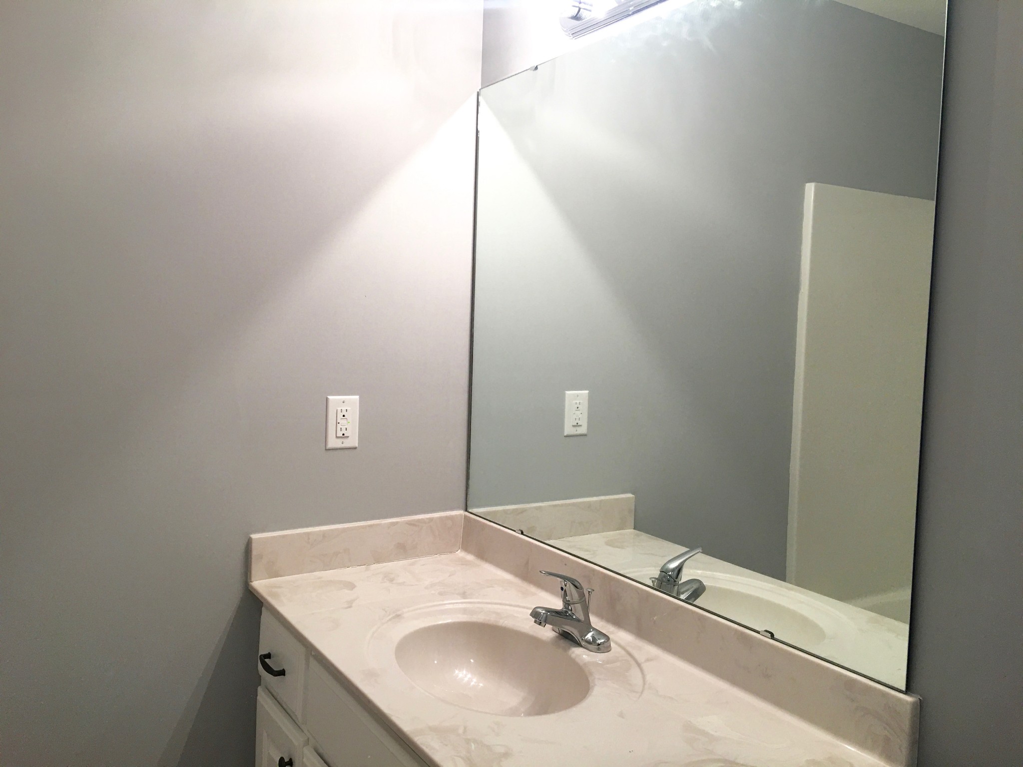 152 Limestone Road Elora, TN 37328 - Photo 16 of 18 a bathroom with a sink and a mirror