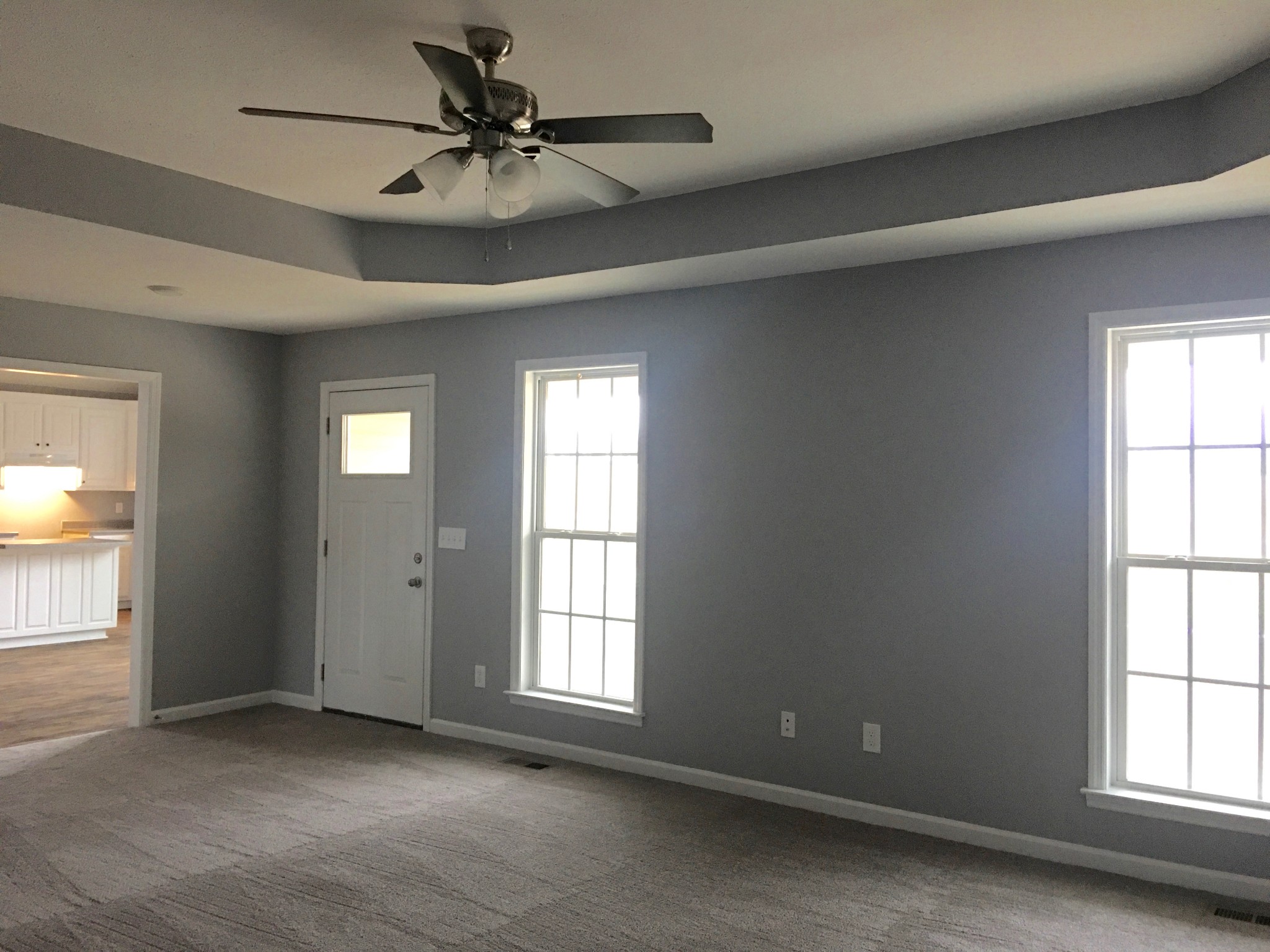 152 Limestone Road Elora, TN 37328 - Photo 5 of 18 an empty room with windows and chandelier fan