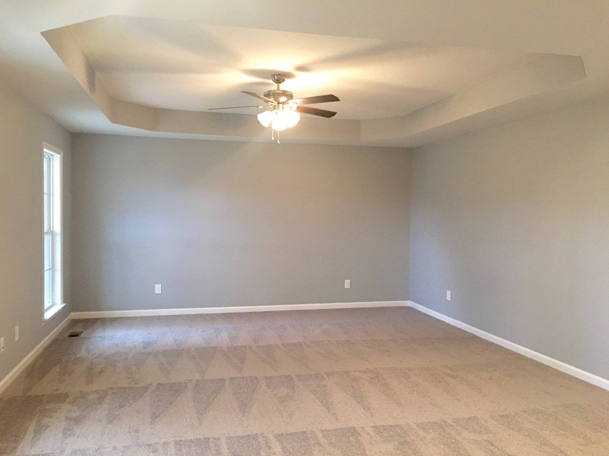 152 Limestone Road Elora, TN 37328 - Photo 7 of 18 a view of an empty room with a chandelier fan