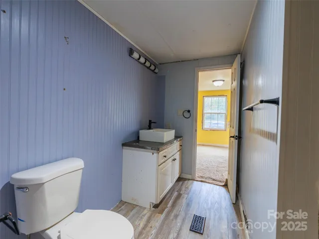 a bathroom with a sink and a toilet