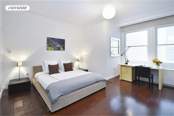 a picture of a book and a white wall