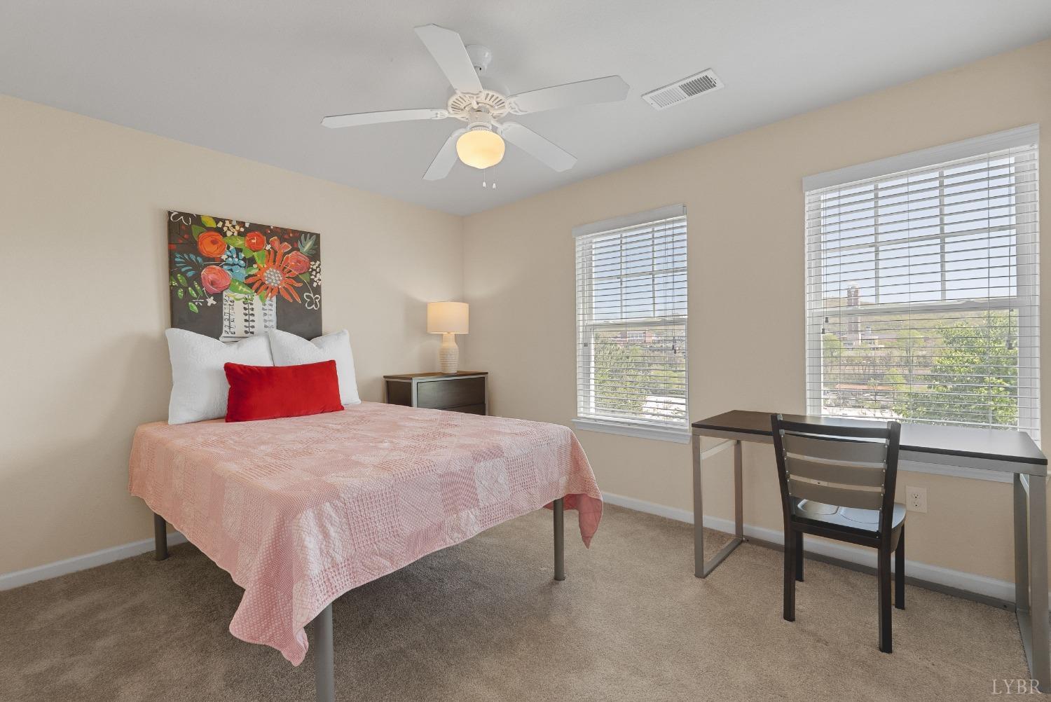 1600 Wards Ferry Road, Unit 704 Lynchburg, VA 24502 - Photo 18 of 49 a bedroom with a bed and a large window