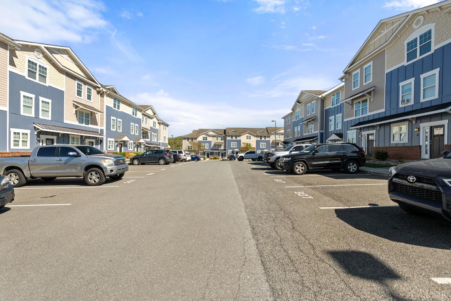 1600 Wards Ferry Road, Unit 704 Lynchburg, VA 24502 - Photo 45 of 49 a city street lined with parked cars and buildings