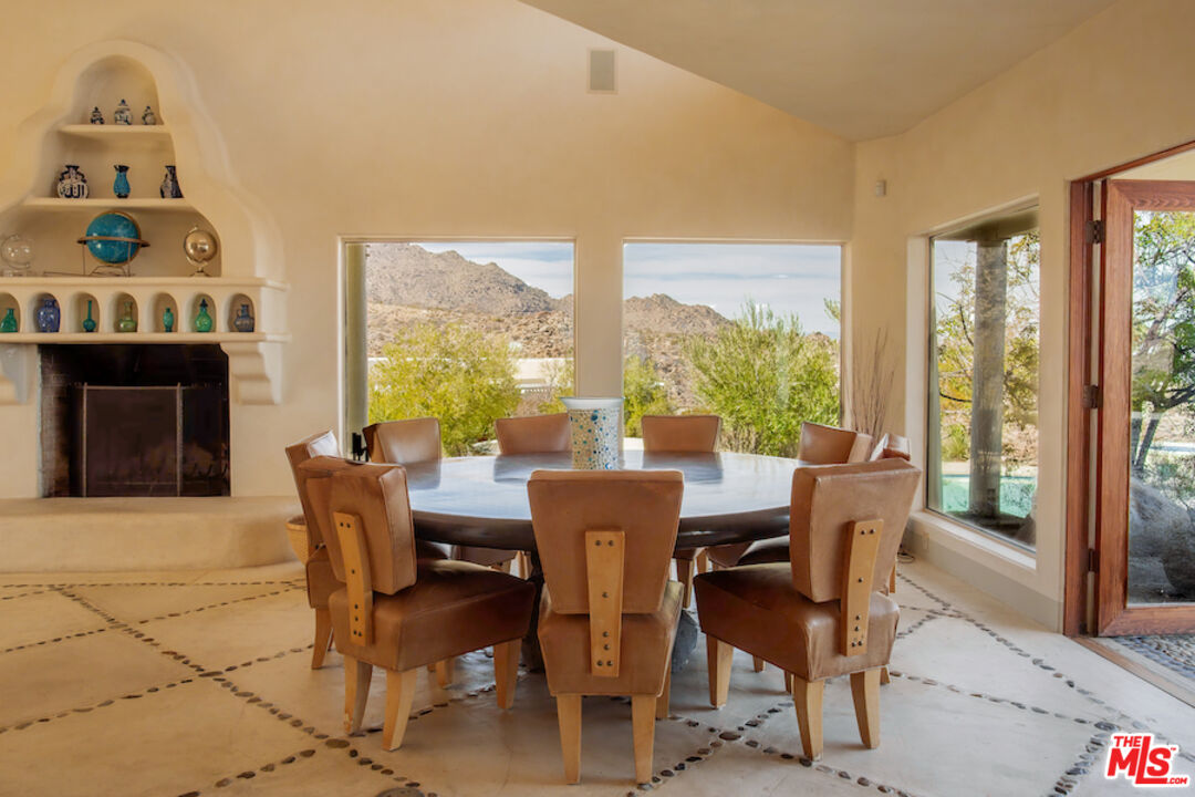 57425 Palm Seco Circle Mountain Center, CA 92561 - Photo 12 of 61 a view of a dining room with furniture window and outside view