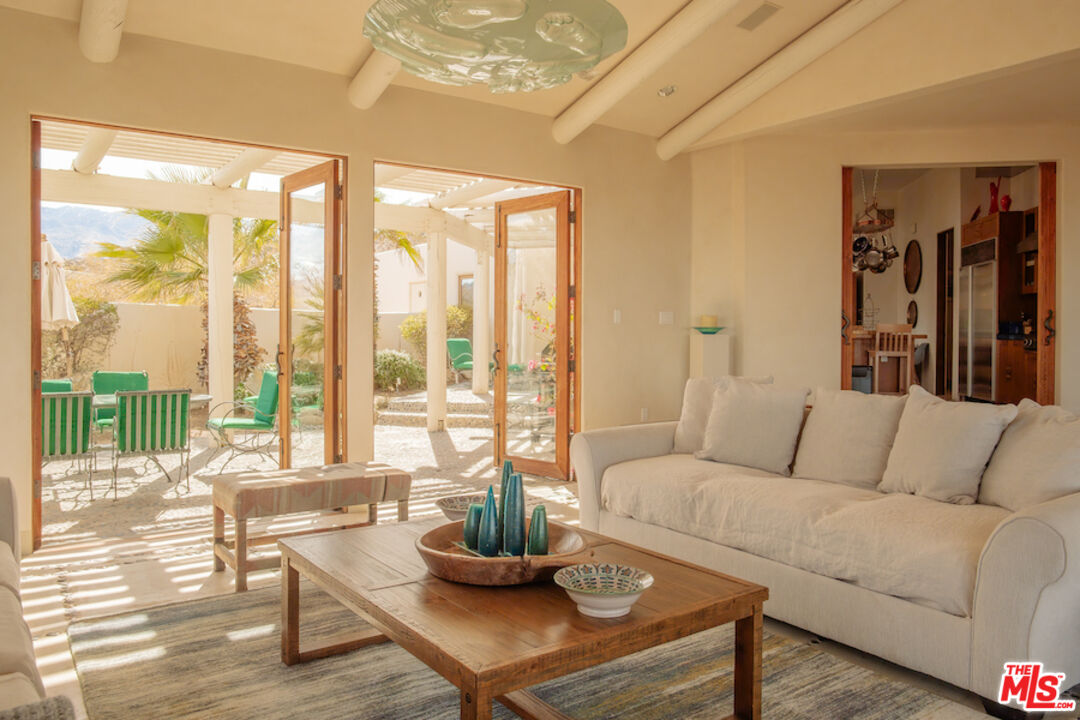 57425 Palm Seco Circle Mountain Center, CA 92561 - Photo 15 of 61 a living room with furniture and a large window