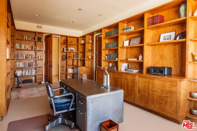 a bathroom with bathtub and window
