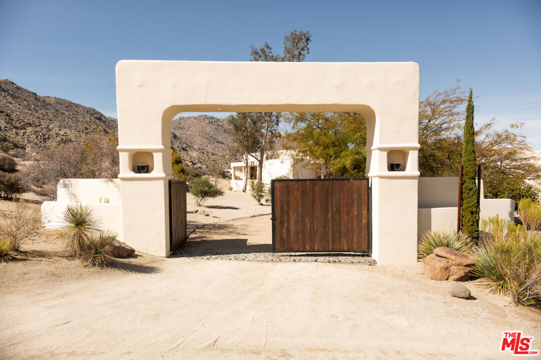 57425 Palm Seco Circle Mountain Center, CA 92561 - Photo 3 of 61 a view of a house with a yard