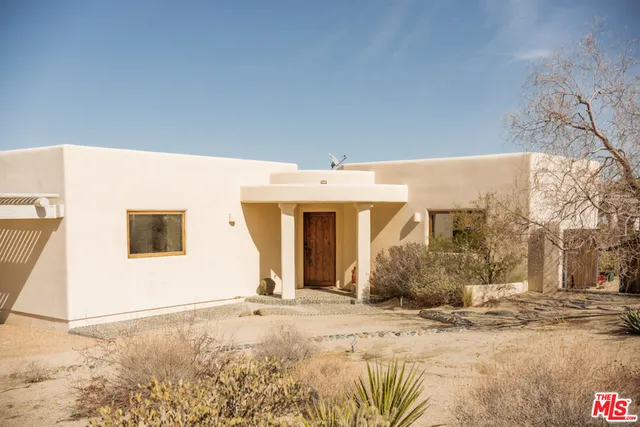 a view of a house with a patio