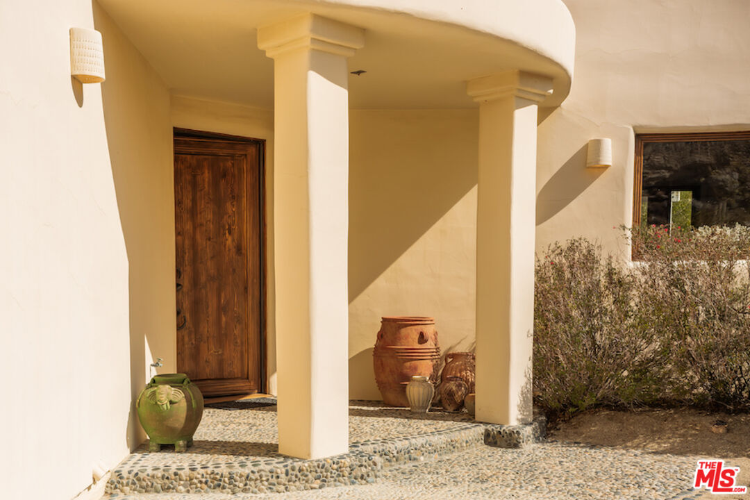 57425 Palm Seco Circle Mountain Center, CA 92561 - Photo 46 of 61 a view of a entryway front of a house